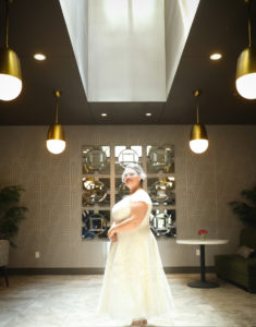 Bride standing in the Breakfast area of the Fifth Avenue Syndicate